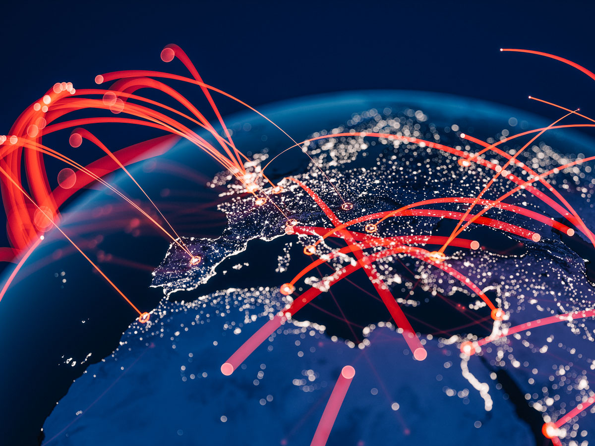 Leuchtende Punkte auf einer Weltkarte mit roten Linien, die globale Verbindungen darstellen.