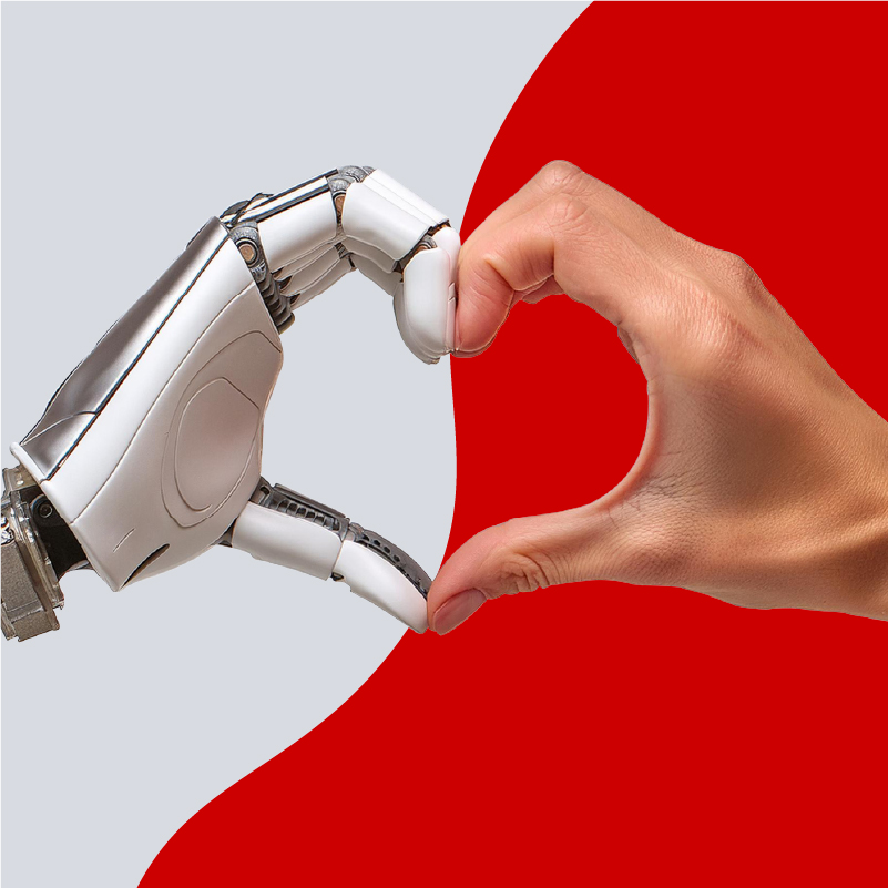 Eine menschliche und eine Roboterhand formen gemeinsam ein Herz vor rotem Hintergrund.